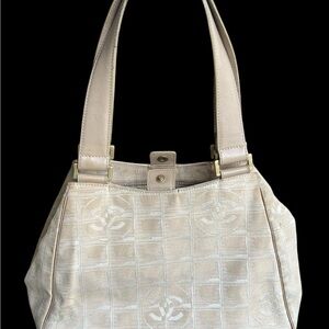 CHANEL Cream Canvas Travel Line
